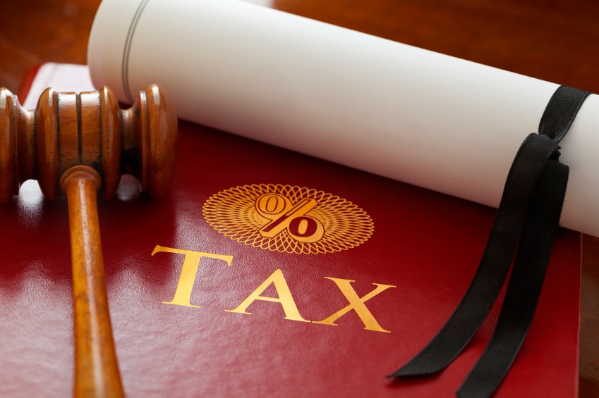 Gavel and Tax Law Sign