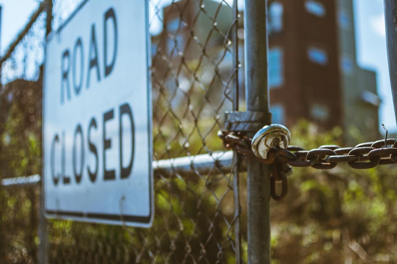 Road closed sign representing the denial of ltd benefits for invisible conditions