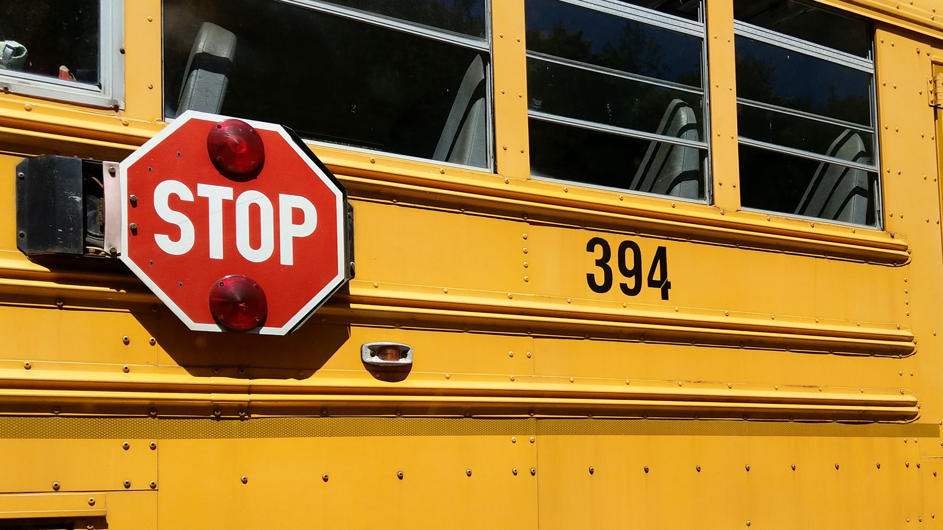 school bus stop sign representing Ontario potentially using cameras to increase safety