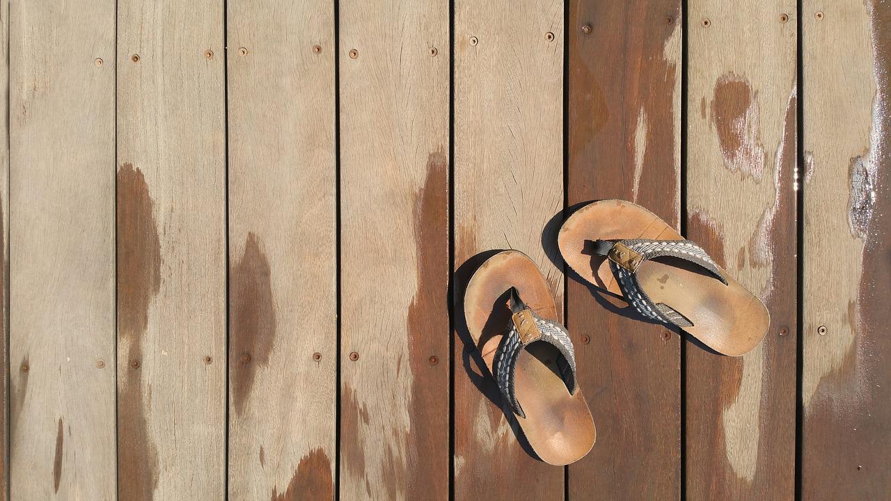 a pair of flip flops on deck