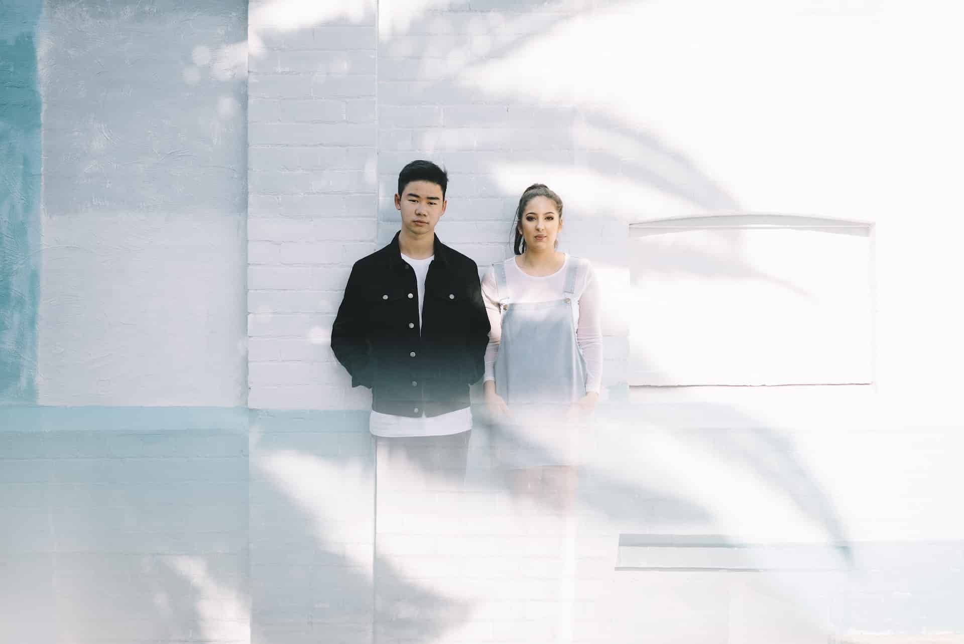 minimalist photography of man and woman