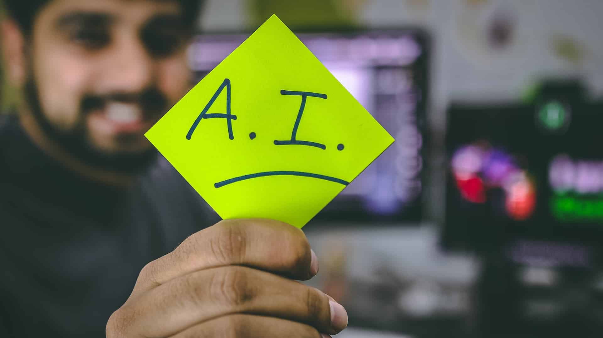person holding green AI sticky note