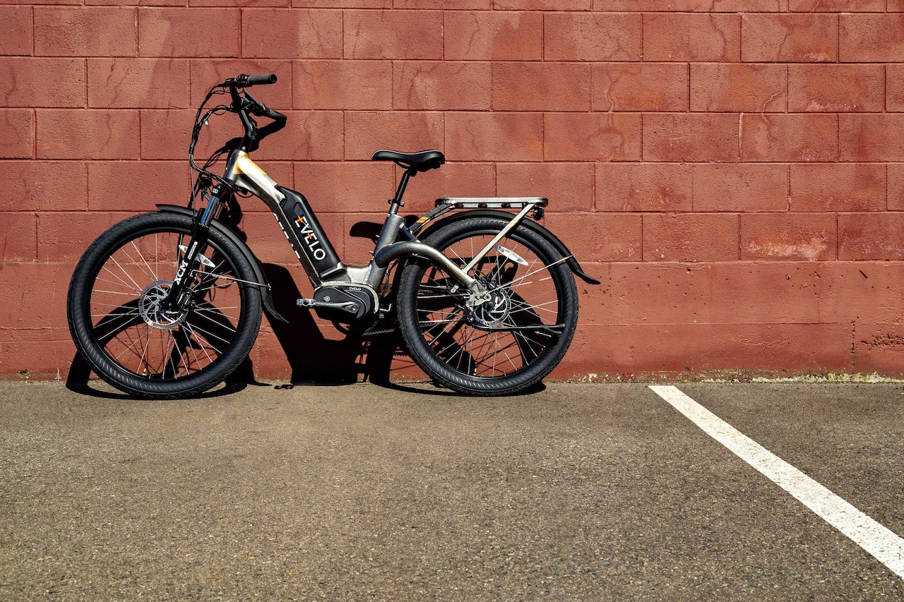 e-bike leaning against a brickwall