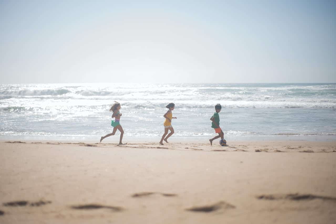 kids playing on the beach