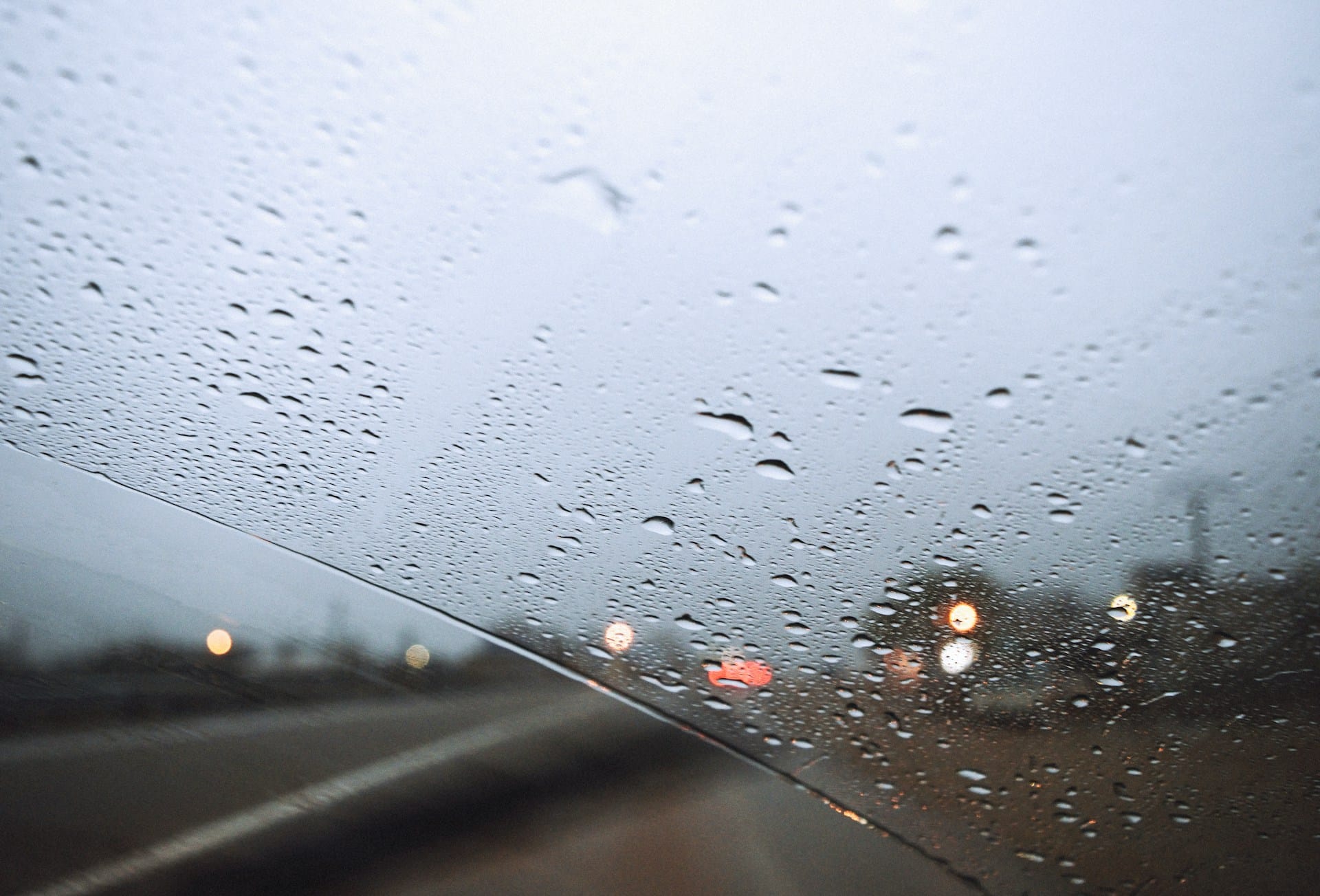 water droplets on windshield of vehicle