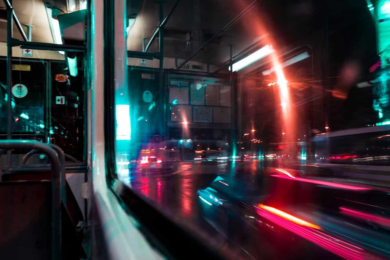 city bus moving at nighttime