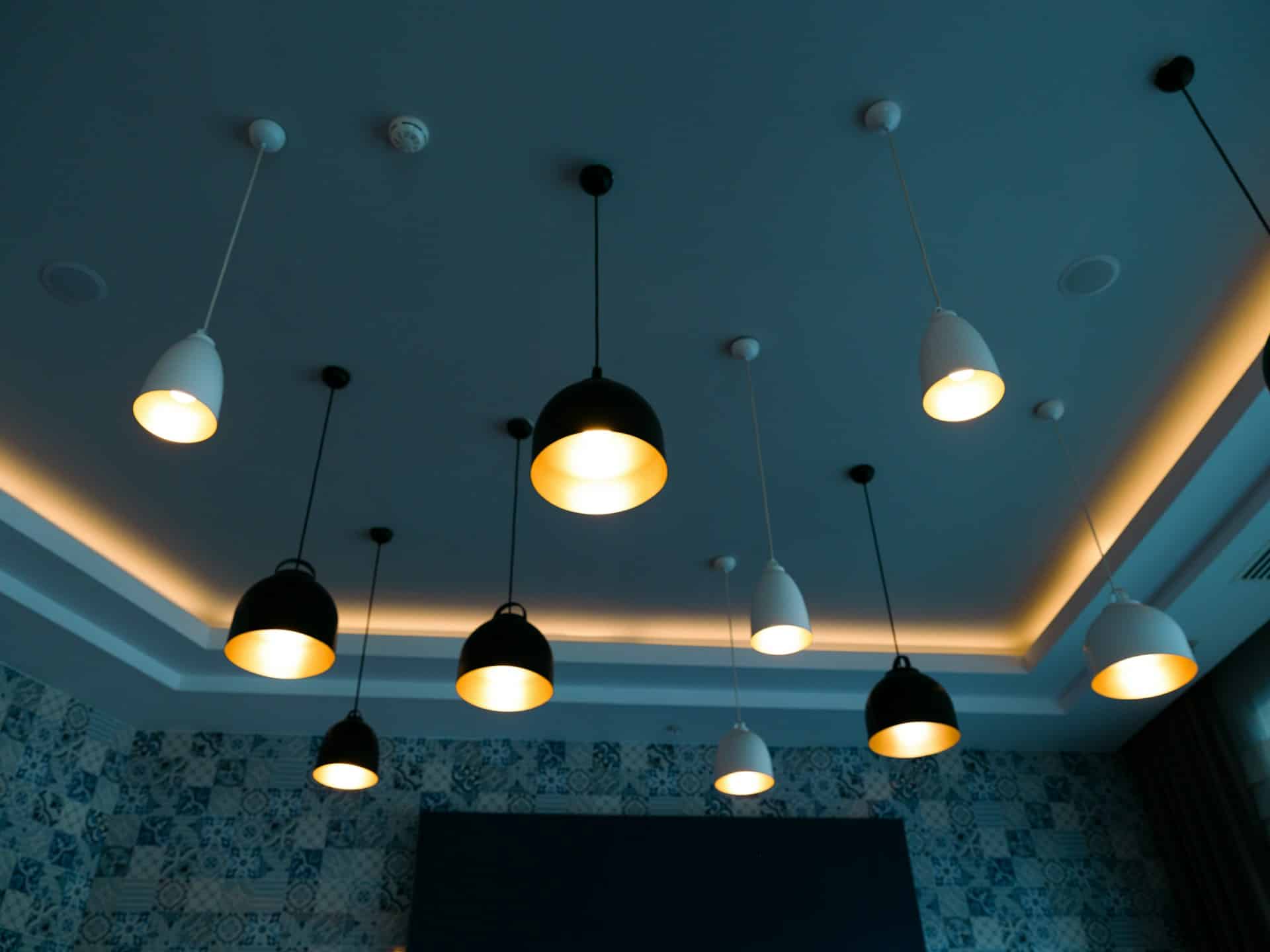 a group of lights hanging from the ceiling